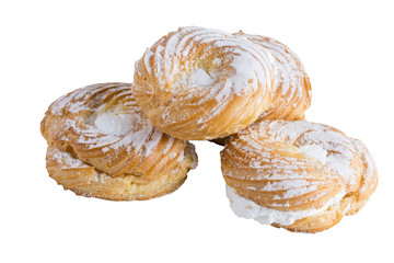 creamy cakes made of puff pastry isolated on white
