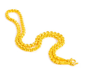 Gold necklace isolated on white.