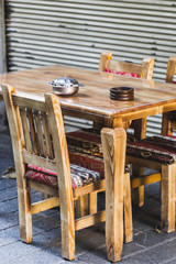 Traditional turkish street cafe with small table and chairs outs