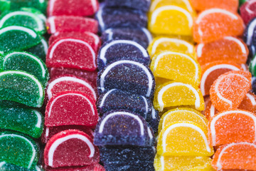 Multicolored marmalade on store shelves