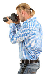 Handsome photographer with camera, isolated on white