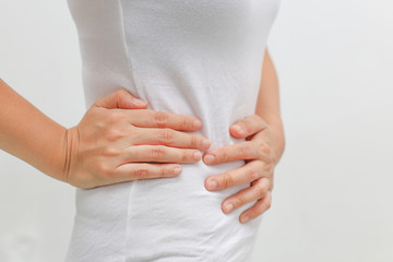 Stomach pain . Negative human emotion expression reaction health issues problems on a white...