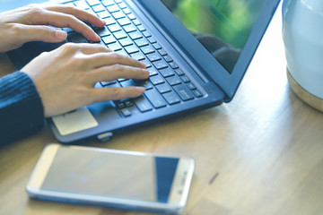 Businesswoman  working with modern devices, laptop computer and