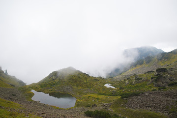 Beautiful mountain lake surrounded by impressive mountains of th