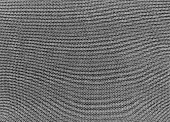Gray knitted material texture.