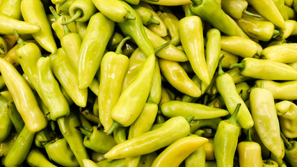 the green pepper on shelf for sell in supermarket