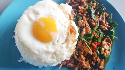 the Spicy fried beef and basil leave with fried egg