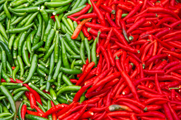 Red and green chili for cooking in the market.