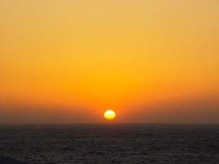 Fototapeta na wymiar The sunset in Mykonos island in Greece