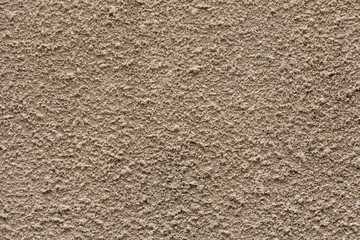 Beige decorative plaster close up
