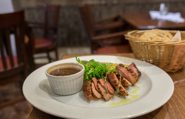 Duck Breast served with plum jam and salad