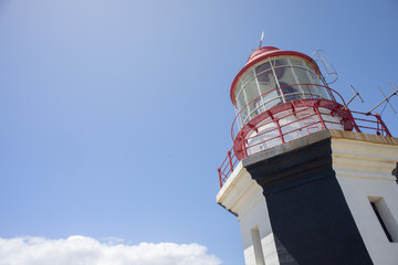 Top of Lighthouse in Blue Sky