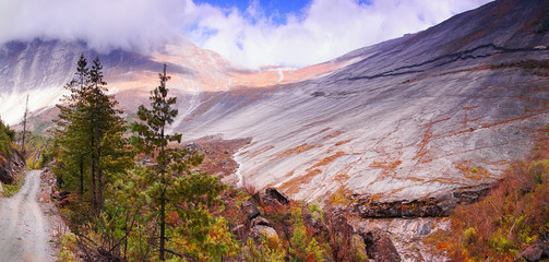 Naklejka premium Horizontal Panoramic view of Mount Swargadwari Danda from Pisang on Annapurna Circuit Trek in Annapurna Himal, Nepal, Asia