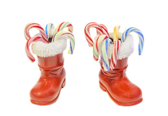 Red Santa Claus boots, Saint Nicholas, with colored candies bars
