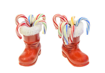 Red Santa Claus boots, Saint Nicholas, with colored candies bars