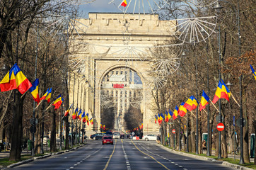 The Arch of Triumph (Arcul de Triumf) from Bucharest Romania, National Day - obrazy, fototapety, plakaty