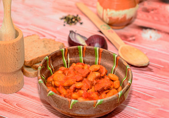 Romanian traditional food, beans with smoked pork (fasole cu ciolan)