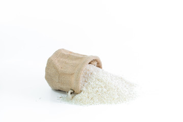 White long rice in a sack and wooden scoop isolated on white background