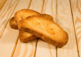 Image of crackers on a wooden table close-up