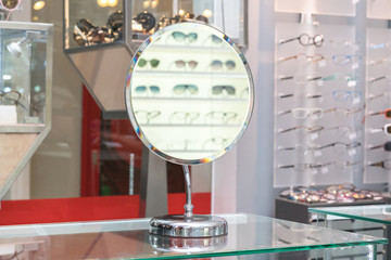 mirror in  glasses shop