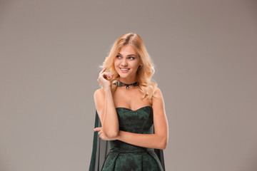 Fototapeta premium The young woman's portrait with happy emotions