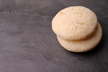 homemade macaron on stone slate board.