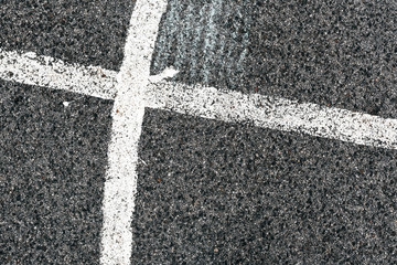 Fototapeta na wymiar White line and asphalt road as simple urban background pattern
