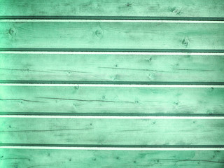 Obraz premium Surface of an empty green wooden background.