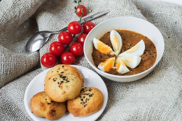 Bean soup, pastry and cherry tomato