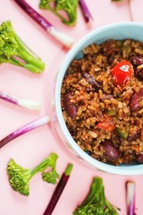 Vegetable risotto, leaves around bowl