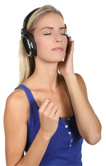 Naklejka premium Pretty Blond Lady Music Listener