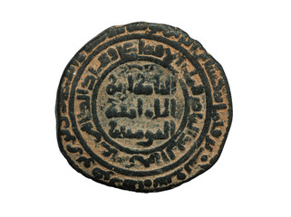 Ancient round islamic copper coin with arabic letters isolated on white