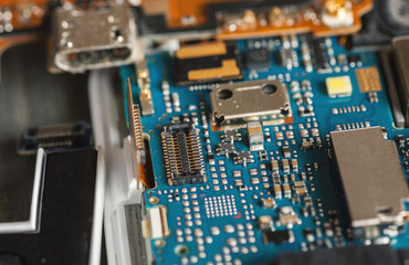 Repair of digital gadget close-up macro shot