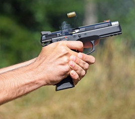 Shooting with a handgun