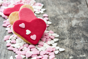 Plakat Valentine cookies with heart shape on wooden background.Copyspace 