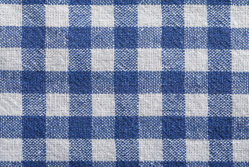 Checkered white-blue napkin flat lay abstract background