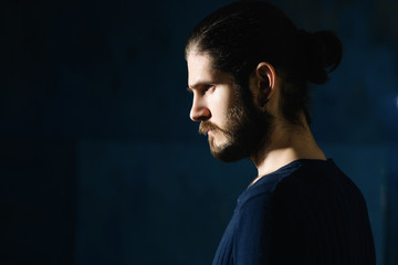 young bearded hipster man. facial profile. 