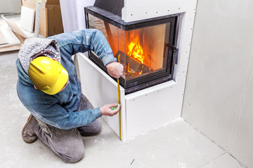 Fireplace installing. Fireplace made from Calcium Silicate Fire Protective Board