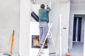 Fireplace installing. Fireplace made from Calcium Silicate Fire Protective Board
