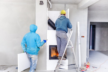 Fireplace installing. Fireplace made from Calcium Silicate Fire Protective Board