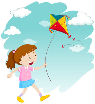 Little girl playing kite