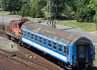 Obraz premium Passenger train with one railway carriage