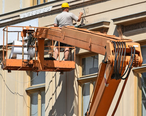 Construction worker on a crane