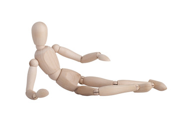 Wooden mannequin lying