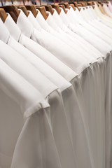Obraz na płótnie Canvas row of white shirts