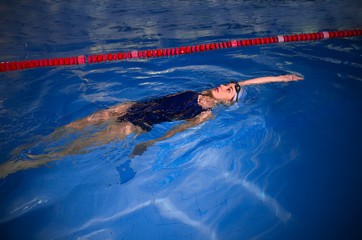 Young woman swimmer