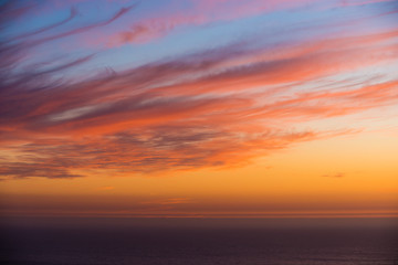 Fototapeta na wymiar Vivid sunset with horizon of Atlantic ocean