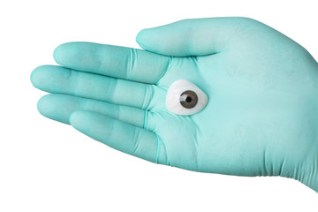 ocular prosthesis in the hands of the medic