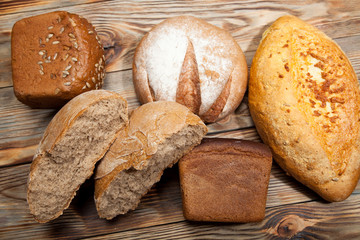 Bread on a rustic wooden background