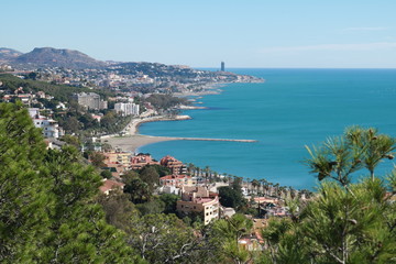 Fototapeta na wymiar Malaga skyline hacia El Palo - vista de malaga